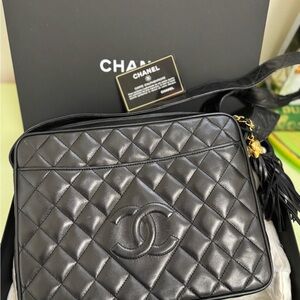 CHANEL Black Leather Bag with Gold Accents